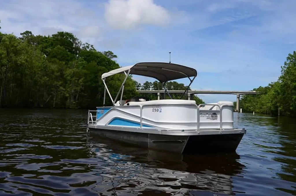 Pontoon boat cruising the Intracoastal Waterway in Myrtle Beach, South Carolina